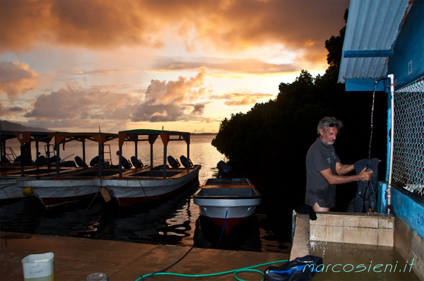 Augusto is washing the suit during sunset