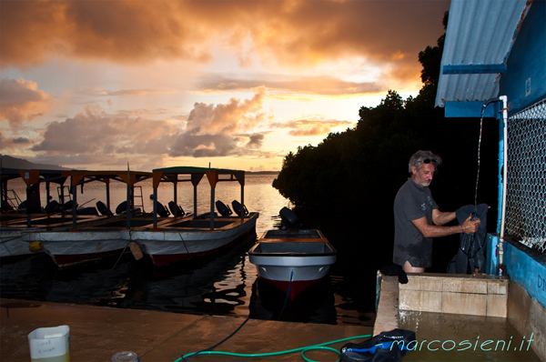 Augusto is washing the suit during sunset Augusto is washing the suit during sunset
